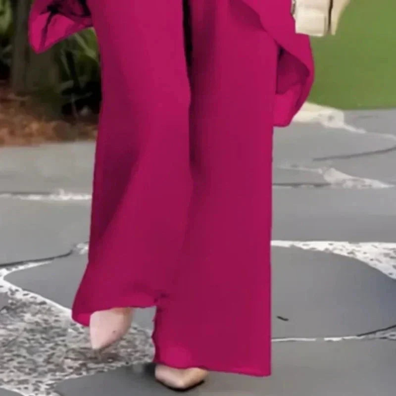 アシンメトリックデザインの女性用セットアップ（ロングブラウスとワイドパンツ）